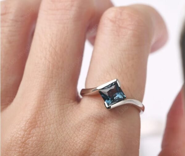 London Princess Cut Blue Topaz Silver Ring worn