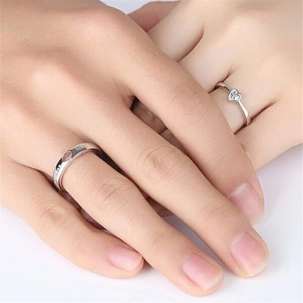 Endless Love with Enclosed Heart Couple Rings on Hands